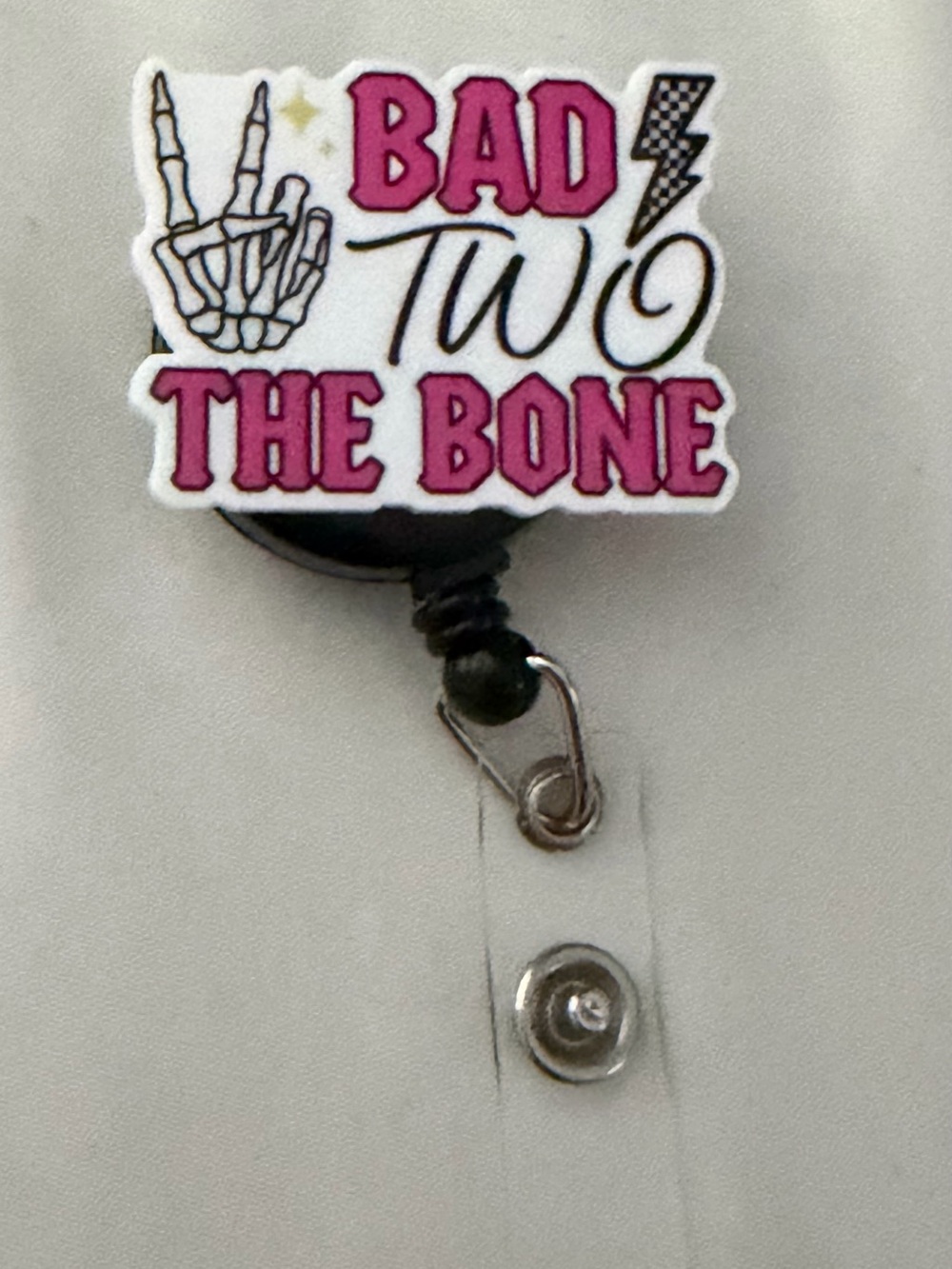 Badge Reel "Bad to the Bone" Pink and White